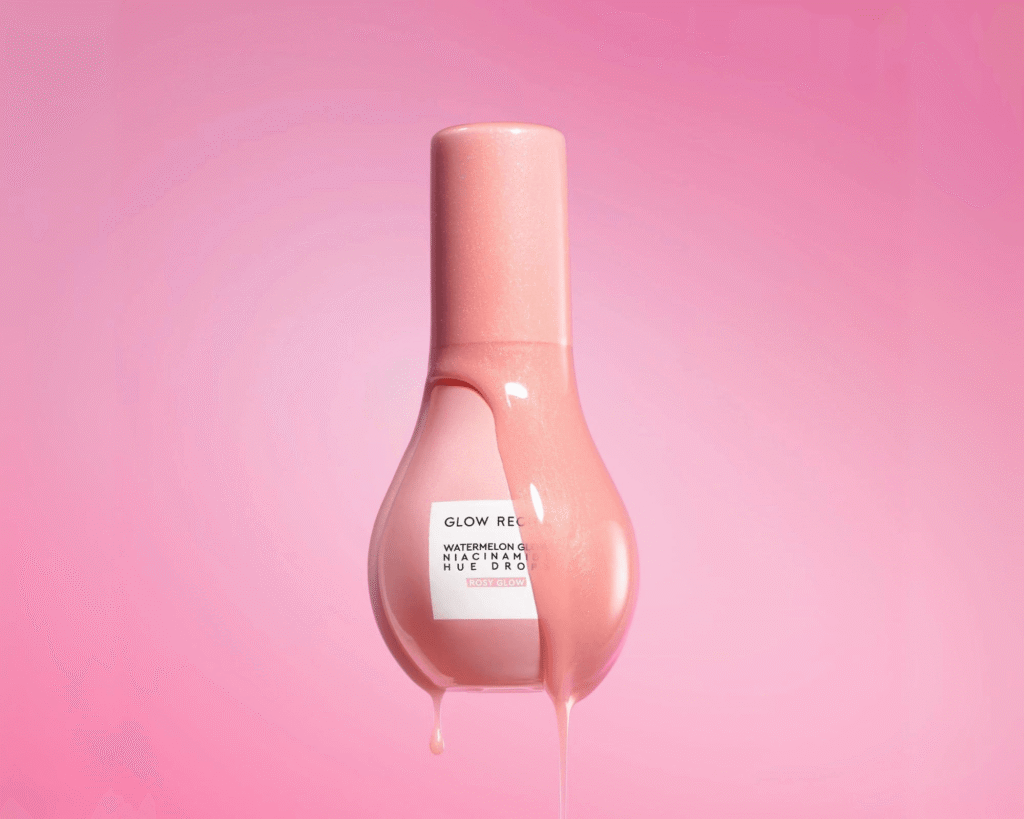 Close-up of Glow Recipe Watermelon Glow Niacinamide Dew Drops bottle with product dripping, ideal for a TikTok beauty finds 2025 feature