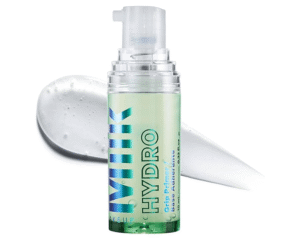 Milk Makeup Hydro Grip Primer bottle with hyaluronic acid, shown with gel texture in background. Featured in blog post: 15 Must-Have Fashion and Beauty Items for 2025.